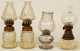 Four Miniature Glass Kerosene Lamps
