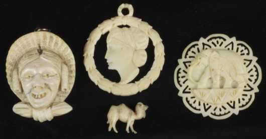 Three Ivory Carved Pendants and a Miniature