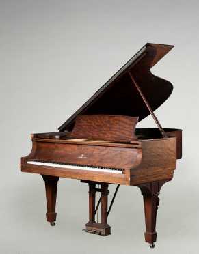 Steinway Grand Piano with Mahogany finish.