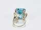 Blue Topaz, Diamond and Yellow gold ring