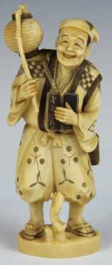 Carved Ivory Smiling Figure of a man