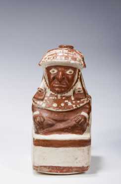 A Moche vessel in the form of a seated nobleman, 300 - 600 AD