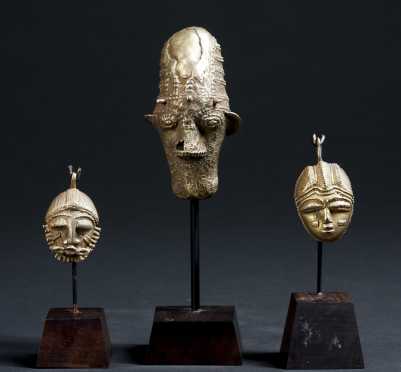 Three Akan Gilded maskettes