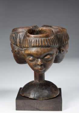 A three faced Pende palm wine cup