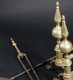 Pair of Steeple Top Brass Andirons and Tools