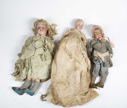 Four Bisque Head Dolls