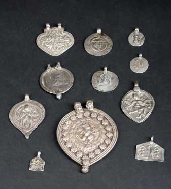 Lot of Eight Indian Silver Amulets