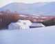 David Dodge, 20thC., Peterborough, NH., Oil on Canvas Painting of a winter farm scene with Mt Monadnock in the distance