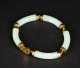 A Nephrite and Yellow Gold Bracelet