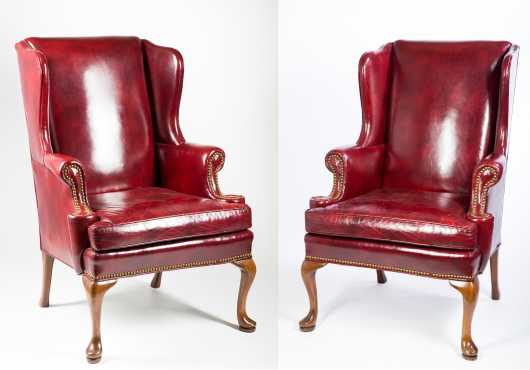 Pair of leather Queen Ann Style arm chairs