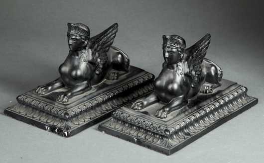 Pair of Egyptian Revival Sphinx form Statues