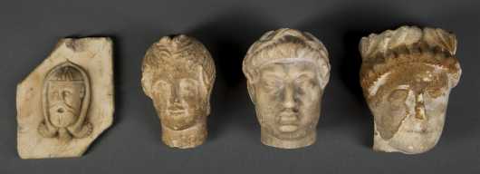 Four Roman Period Stone Heads