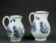Two Worcester Blue and White Handled Pitchers