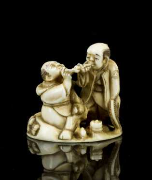 Antique Netsuke, "Seikan", two men smoking
