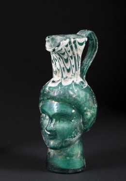 Roman Glass Pitcher With Janus Head Molded Body