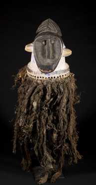 A rare and unusual Burkinabe helmet mask