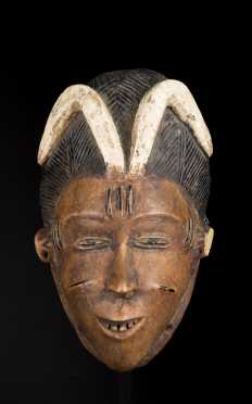 A fine and well carved Guro mask