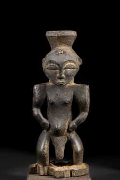 A Hemba or Kusu Male power figure