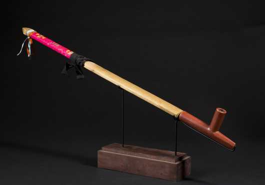 A Fine Plains pipe with quilled stem and catlinite bowl