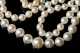 14kt. Gold and Opal Clasped Strand of Graduated Pearls