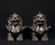 Pair of Chinese Hollow Cast Foo Dogs