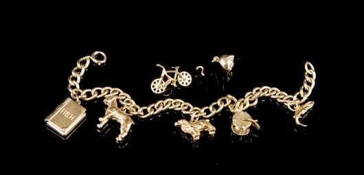 Yellow Gold 14kt. Charm Bracelet with Seven Charms