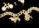 Yellow Gold 14kt. Charm Bracelet with Seven Charms
