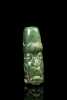 An Olmec Jade Pendant.