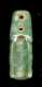 An Olmec Jade Pendant.