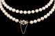 Long Strand of Pearls with Garnet and 9ct Clasp