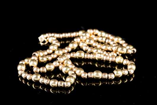 Unmarked Gold beads on Gold Filled Chain