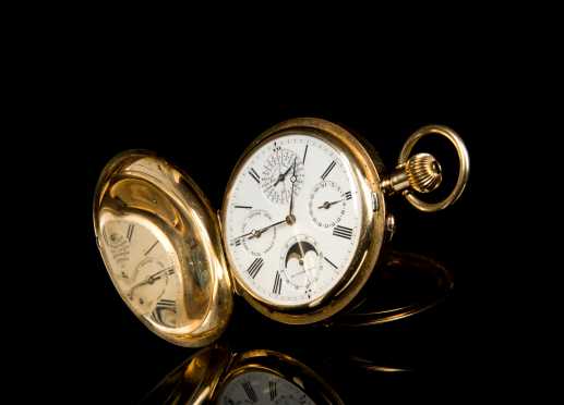 Henry Moser & Cie., Heavy multicolor gold perpetual calendar hunting cased pocket watch for Imperial Russian Market