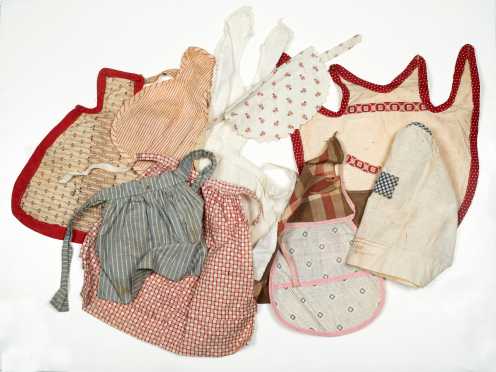 Ten Antique Cotton Plaid and Red Print Doll Aprons