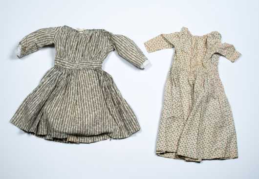 Two Early Hand Sewn Doll Dresses