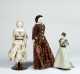 Lot of Three Dolls Two China Dolls and One Untinted Bisque