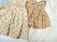 Lot of Eight Doll's Dresses