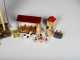 Box Lot of Seventeen Small Wooden Toys and One Mechanical Bisque Headed Acrobat