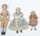 Seven Bisque Head Doll House Dolls with Bisque Arms and Legs and Cloth Bodies