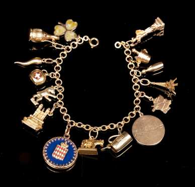 Yellow Gold Charm Bracelet with Fifteen Charms