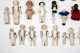Twenty-Four Miscellaneous Small Dolls and Frozen Charlottes