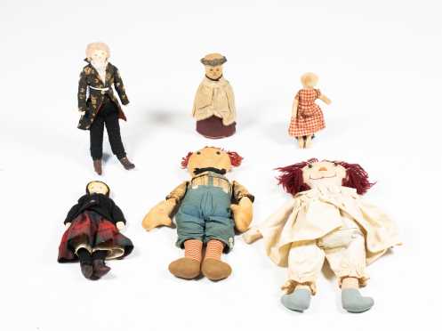 Five Rag Dolls and One Bottle Doll