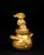 A Pre Columbian Gold Figural Lidded Vessel