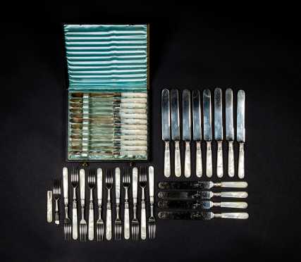 Lot of Mother of Pearl Handled Knives, Forks, and Fruit Knives