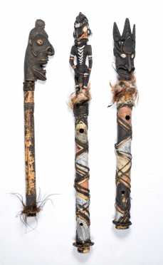 Three Papua New Guinea Flutes with Carved Figural Stoppers