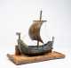 A "Viking" Miniature Boat and Artifacts Lot