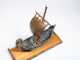 A "Viking" Miniature Boat and Artifacts Lot