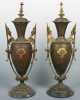 Pair of Bronze and Gilded Mantle Garnitures