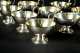 Fourteen Swedish Hammered Sterling Silver Punch Cups