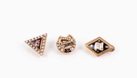 Three Fraternity Gold Pins