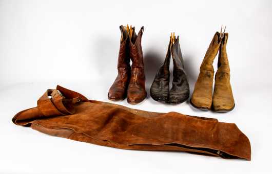 Three Pairs of Cowboy Boots and Suede Chaps